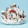 The Holiday Barn Skating Pond Music Box Christmas Music Boxes