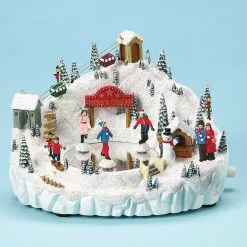 The Holiday Barn Skating Pond Music Box Christmas Music Boxes